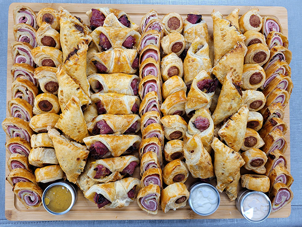 Appetizer Board - Large - includes deli roll, franks in blanks, pastrami danish, and pulled brisket bourekas  